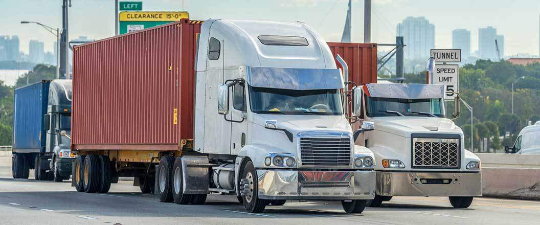 How to Transport a Shipping Container: Overcome Challenges