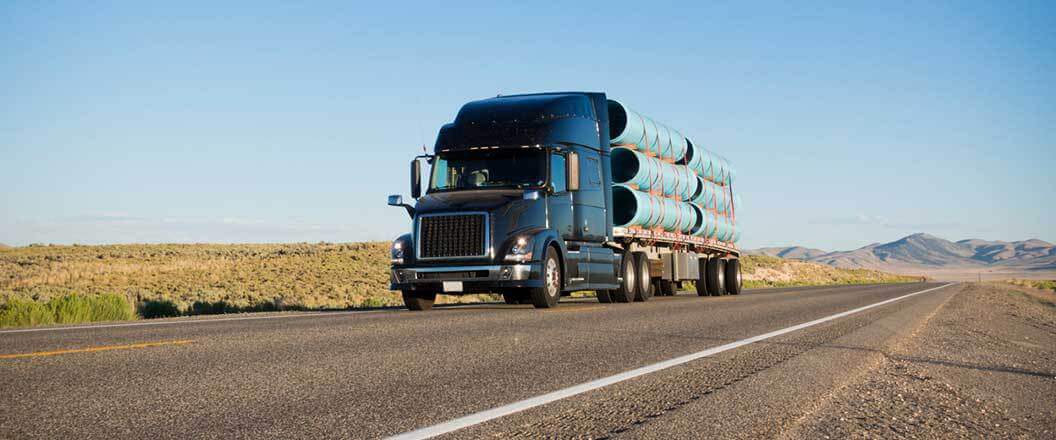 Transporting Pipes on Trucks: Shipping on Flatbeds and More | Heavy ...